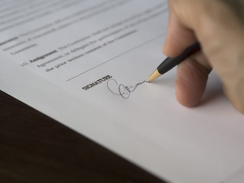 A Notary's legal battle over signing by signature stamp