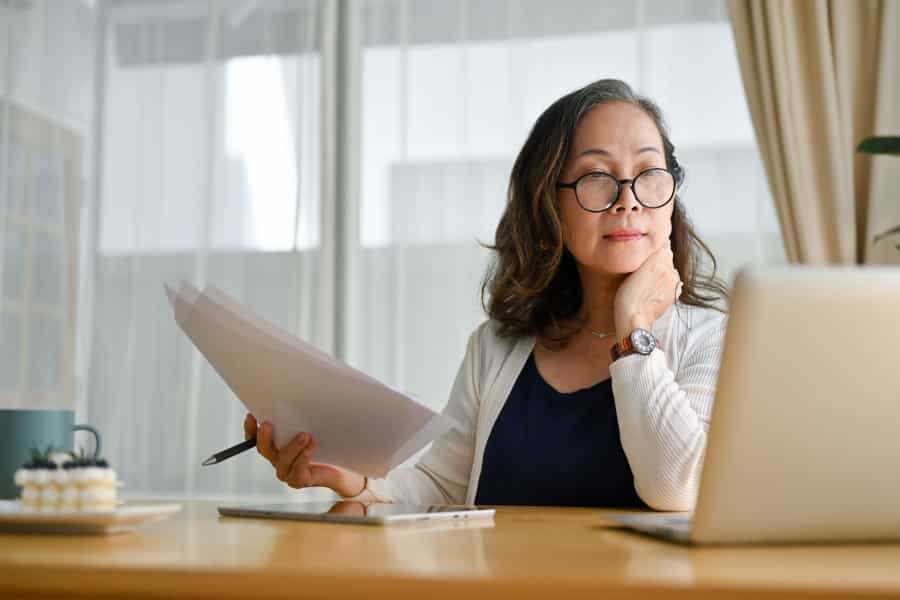 A female looking at her laptop