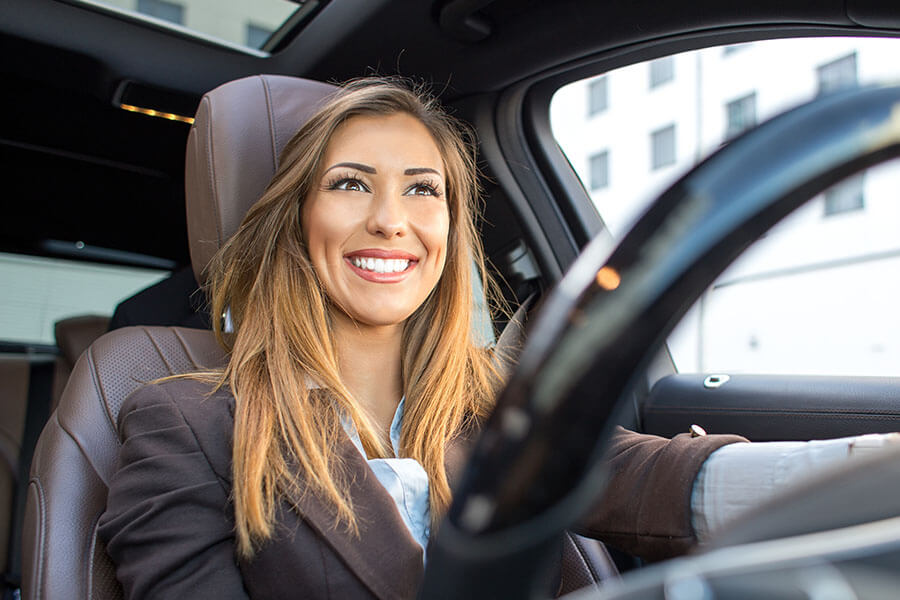 A person driving in a car