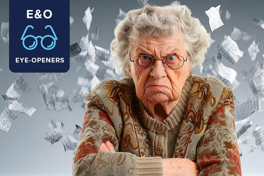 An old woman surrounded by torn pages from a will.