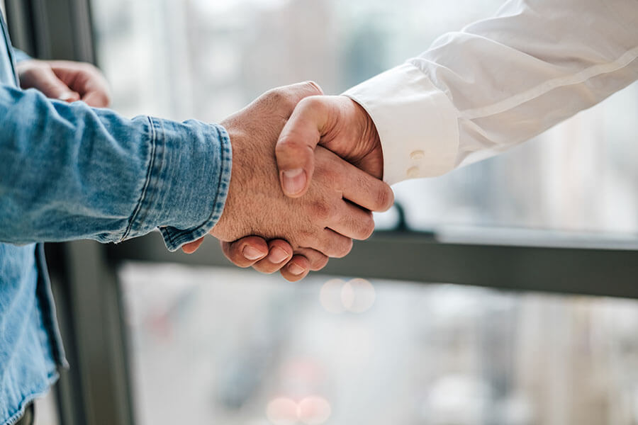 Two people shaking hands