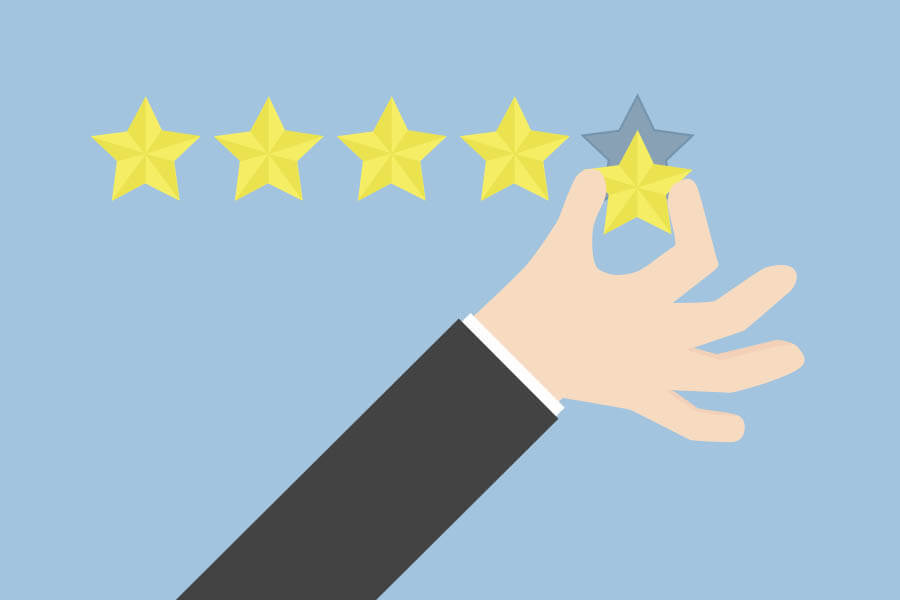 An illustration of a hand in a suit placing the fifth star in a five-star rating system on a blue background.