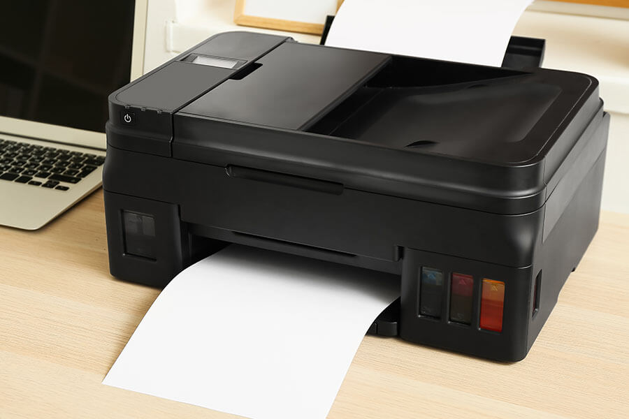 A printer producing a printed document.