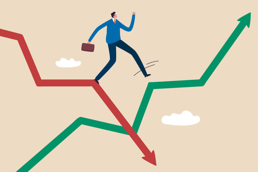 illustration of a man stepping nimbly across downward and upward lines on a graph