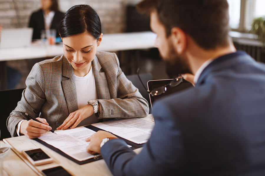 Notary Signing Agent performing split signing