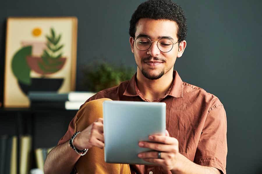 A person looking at a tablet screen